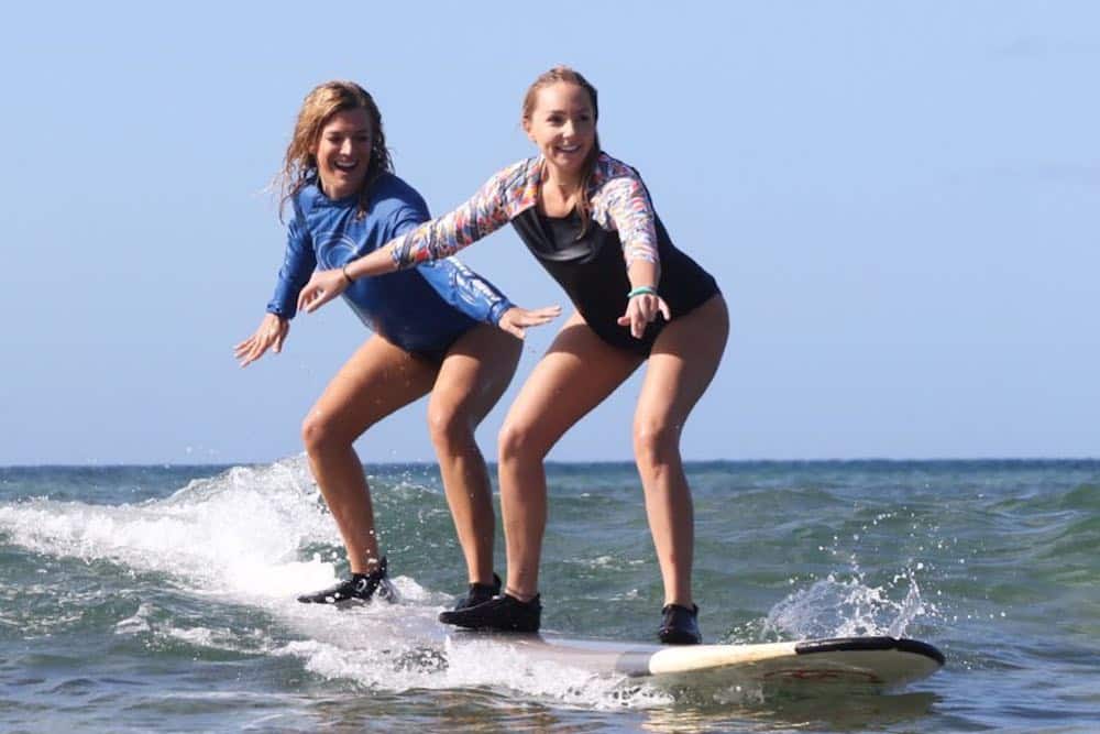 Maui WaveRiders women tandem surfing